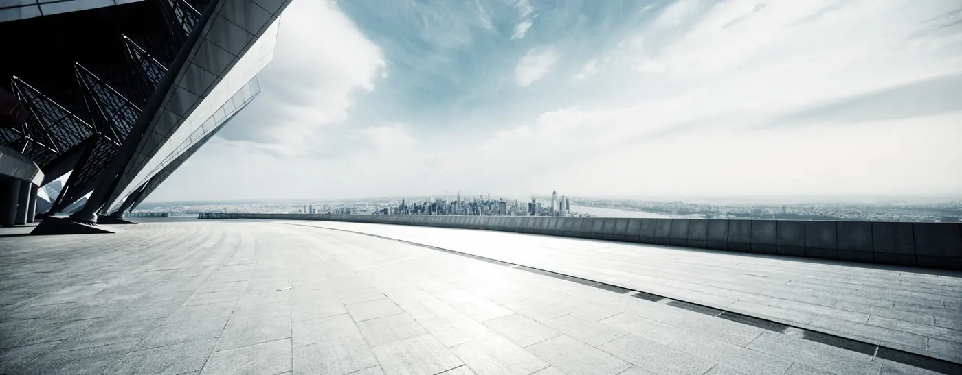 Rooftop terrace overlooking a city skyline